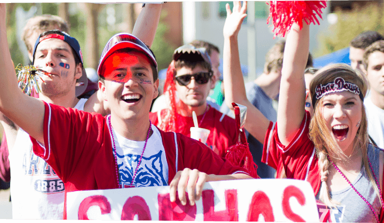 Students cheering together at a campus event